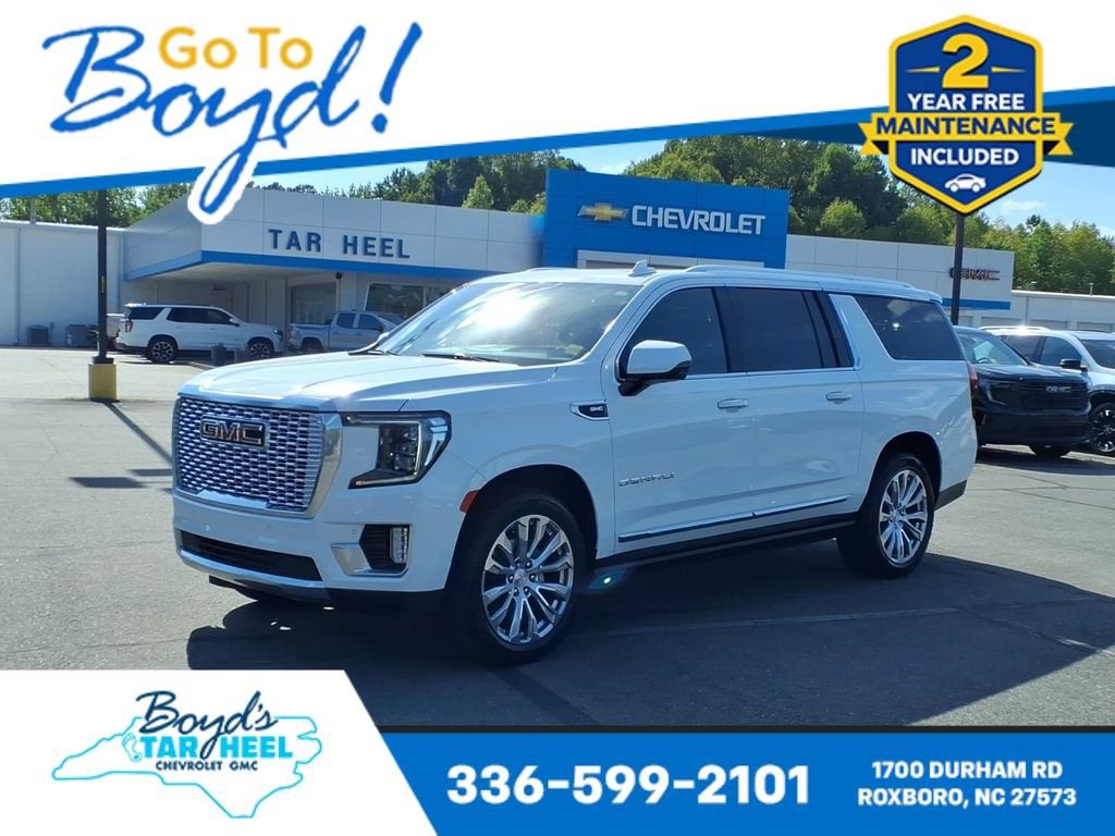 2023 GMC Yukon XL Denali in Summit White — front three-quarter view