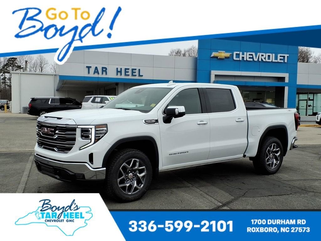 2026 GMC Sierra 1500 SLT in Summit White — front three-quarter view