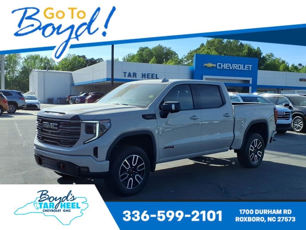2026 GMC Sierra 1500 AT4 in Coastal Dune — front three-quarter view
